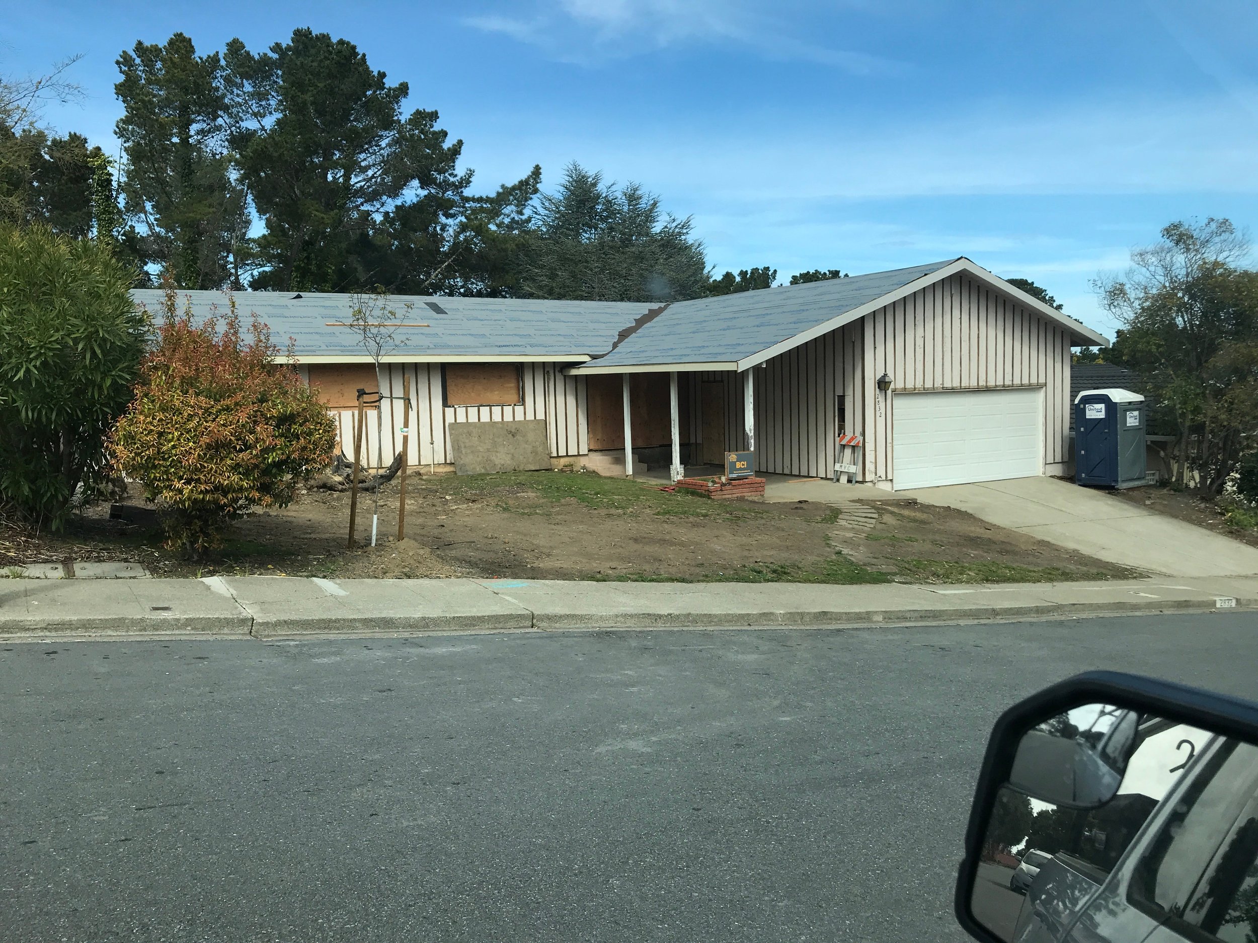 boarded up 1950s ranch home under full gut renovation