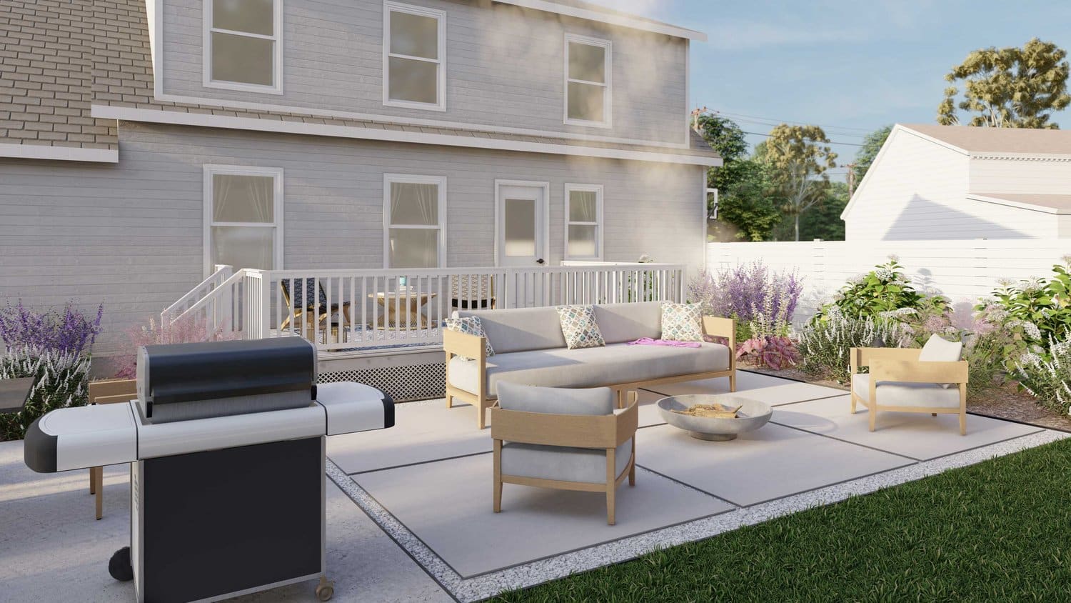 Long Island concrete paver patio with outdoor kitchen and fire pit seating area